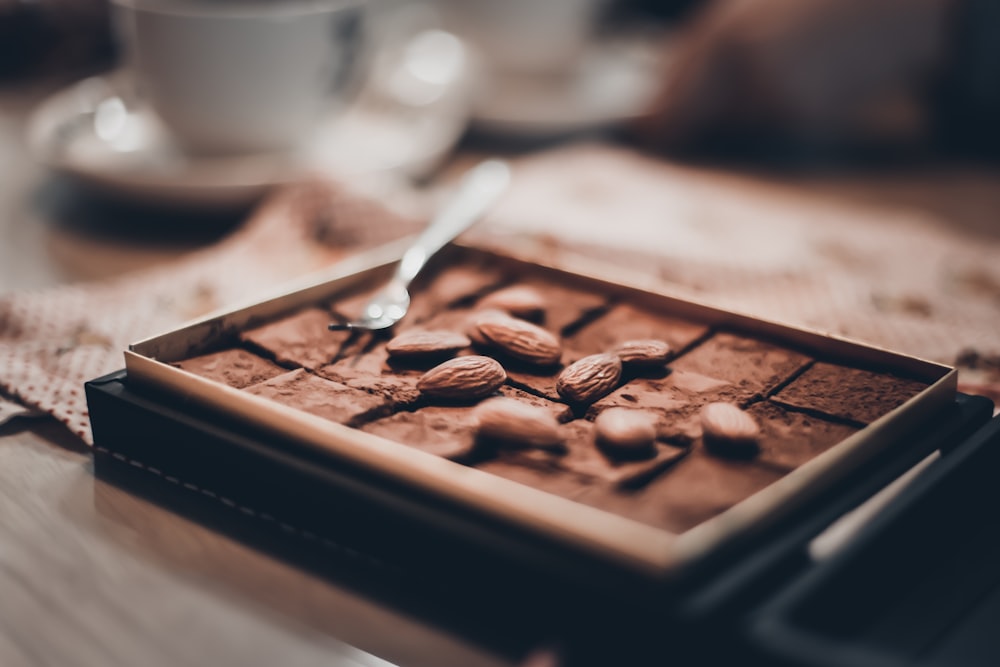 almonds on chocolate bar in box