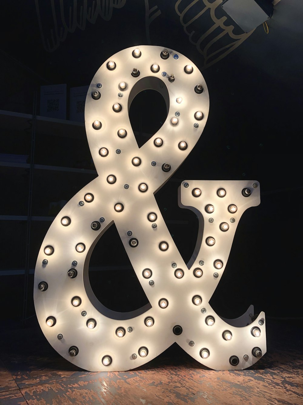 turned-on white ampersand freestanding letter