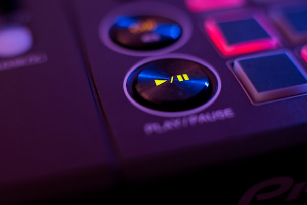 A close-up of a futuristic gadget with vibrant blue accents.
