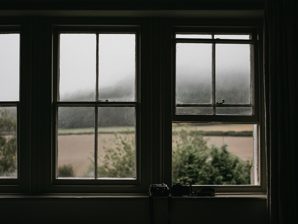 grey metal framed glass window