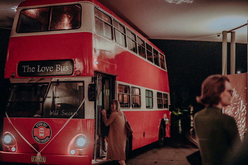 woman going inside bus