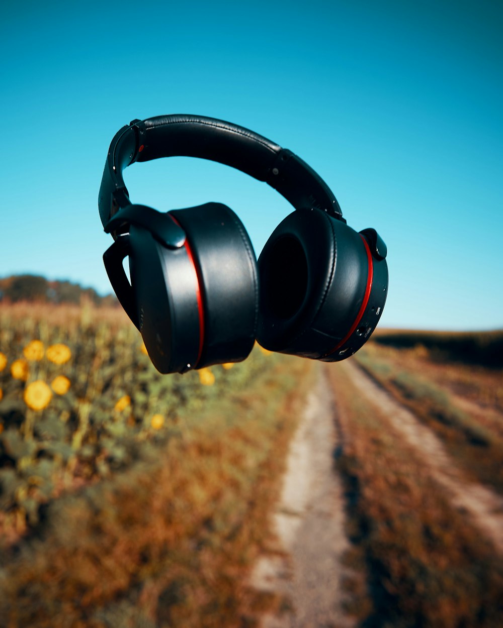 black and red wireless headphones hanging