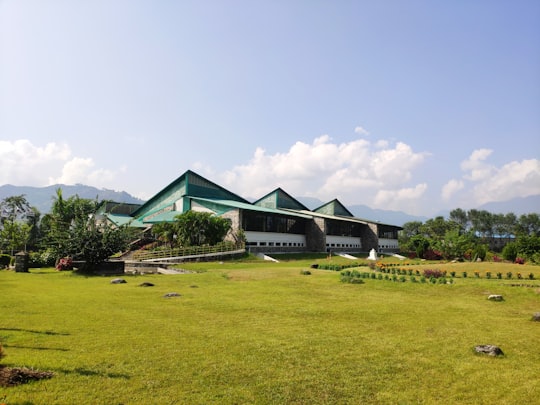 green and white house in International Mountain Museum Nepal