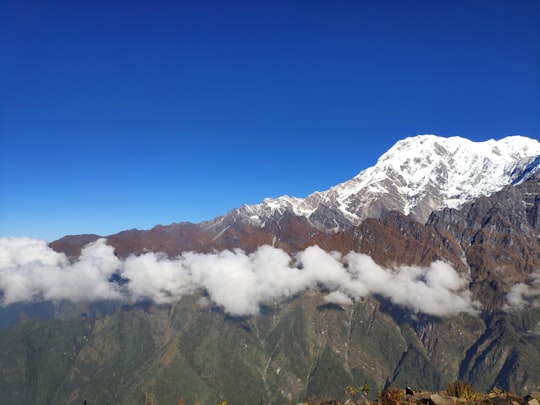 snow-capped mountain during cloudy day in Annapurna Conservation Area Nepal