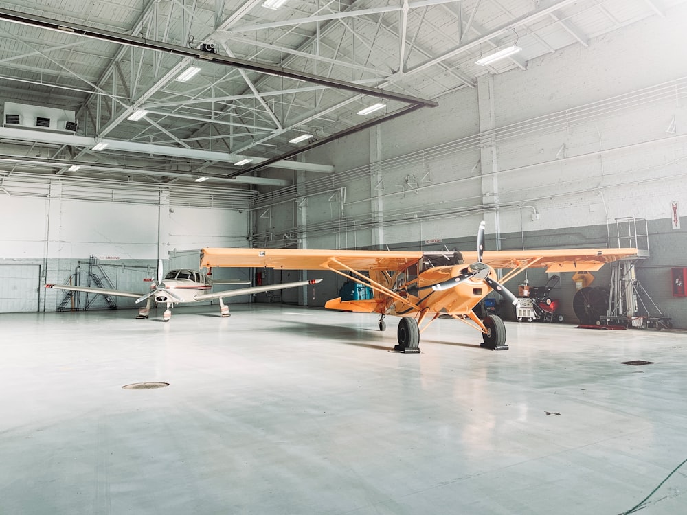 orange biplane