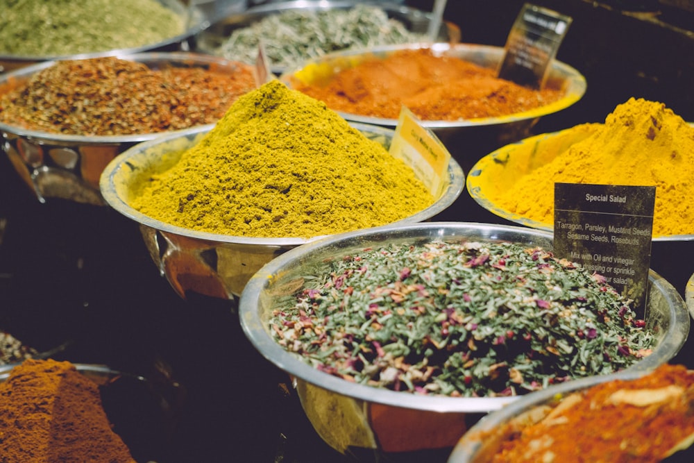 assorted-color powders on basins