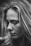 grayscale photography of woman glancing her right side