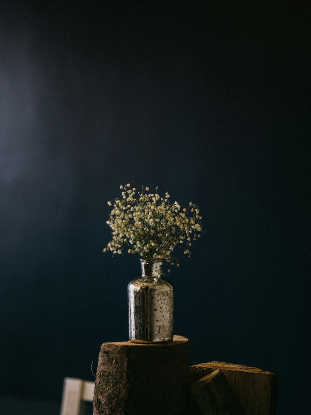 white flowers on grey pot