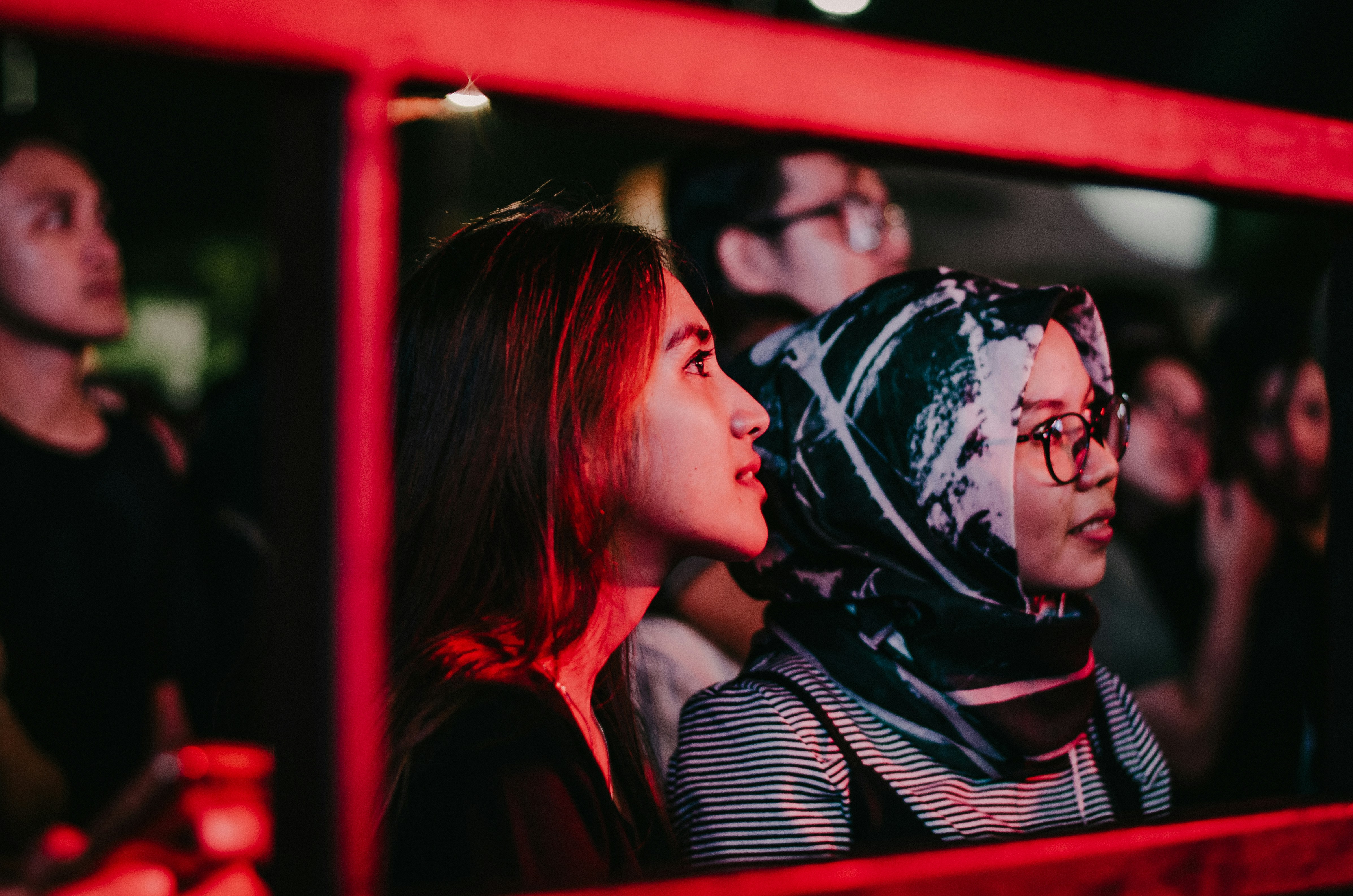 crowd of people inside stadium staring at something