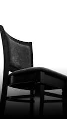 Minimalist metal frame luxury chair complementing a modern interior in Qatar.