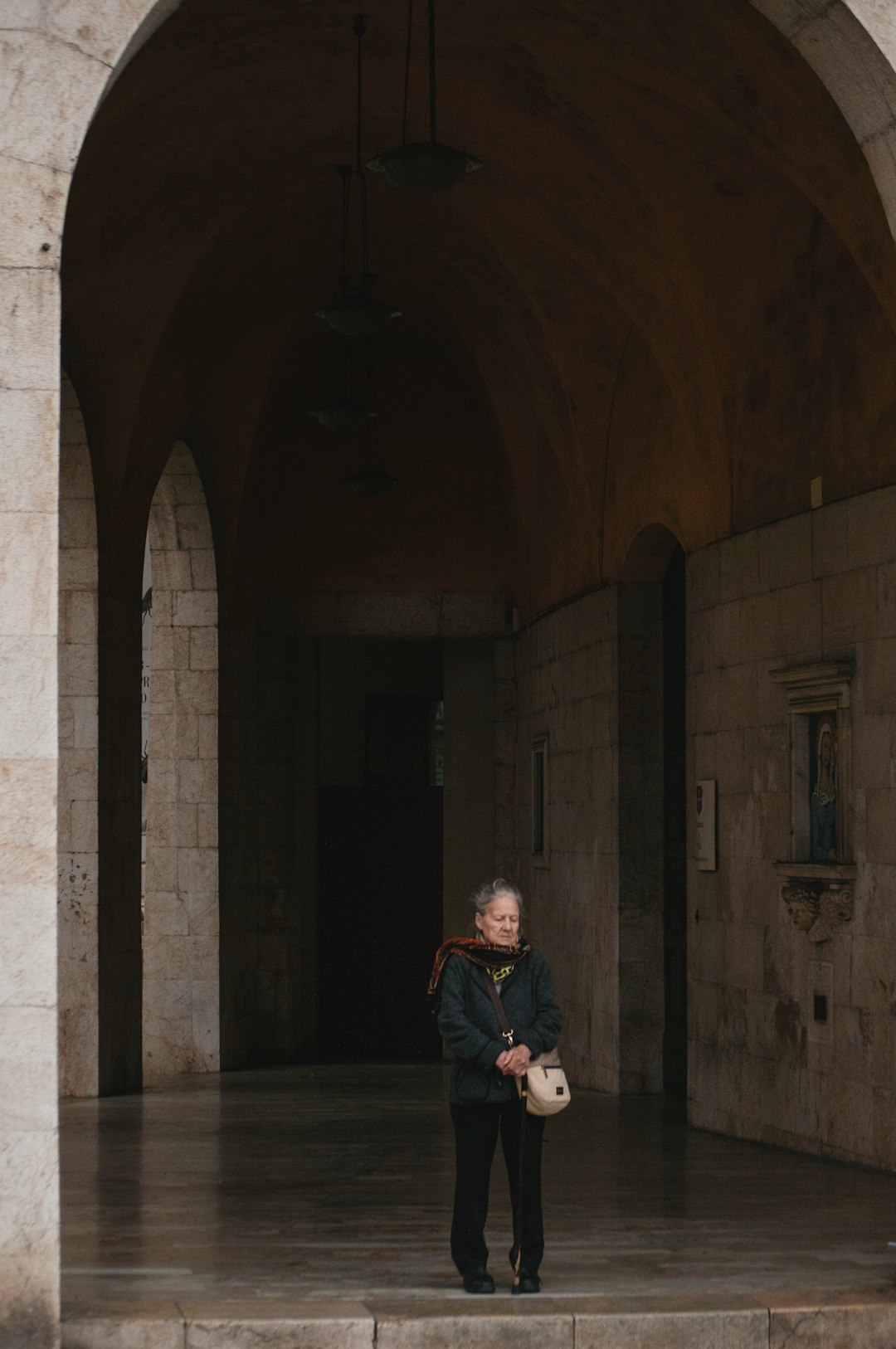 man standing in dome building