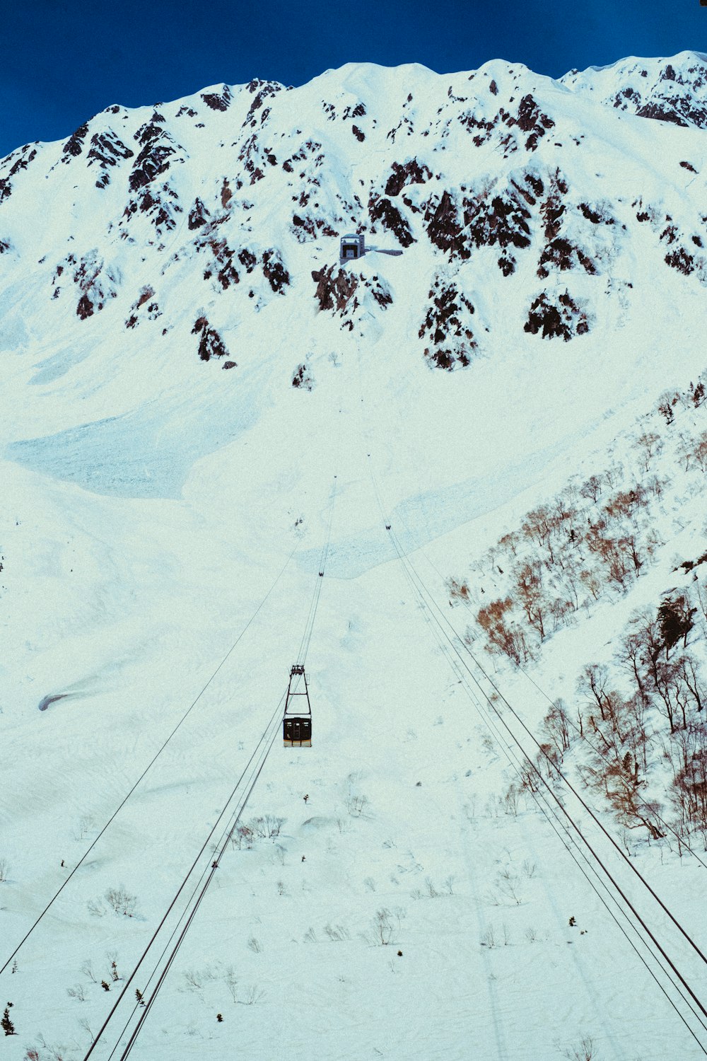 black cable car during daytime