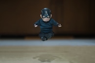 A figurine captured mid-action pose, emphasizing dynamic design and quality.