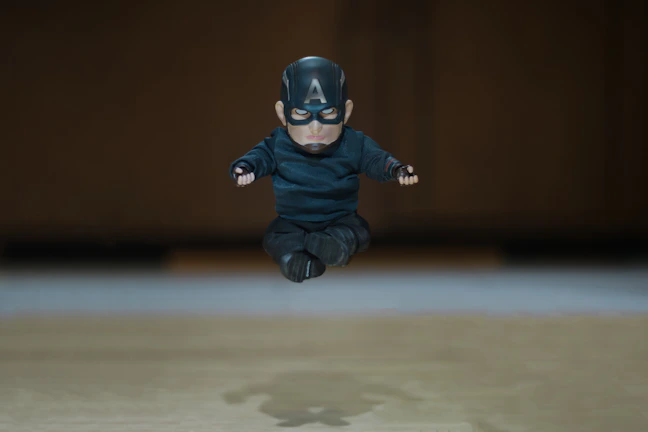 An athlete mid-action captured perfectly in a 3D printed figurine, showcasing dynamic movement.