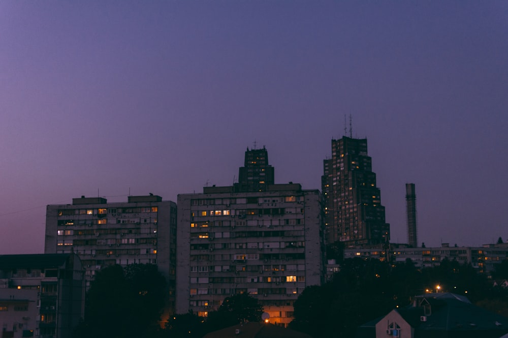 city with high-rise buildings during night time