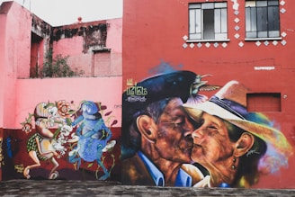 buildings with murals during day