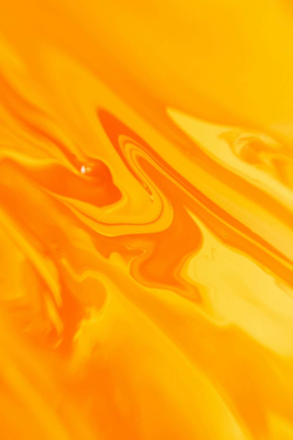 a close up view of a yellow liquid