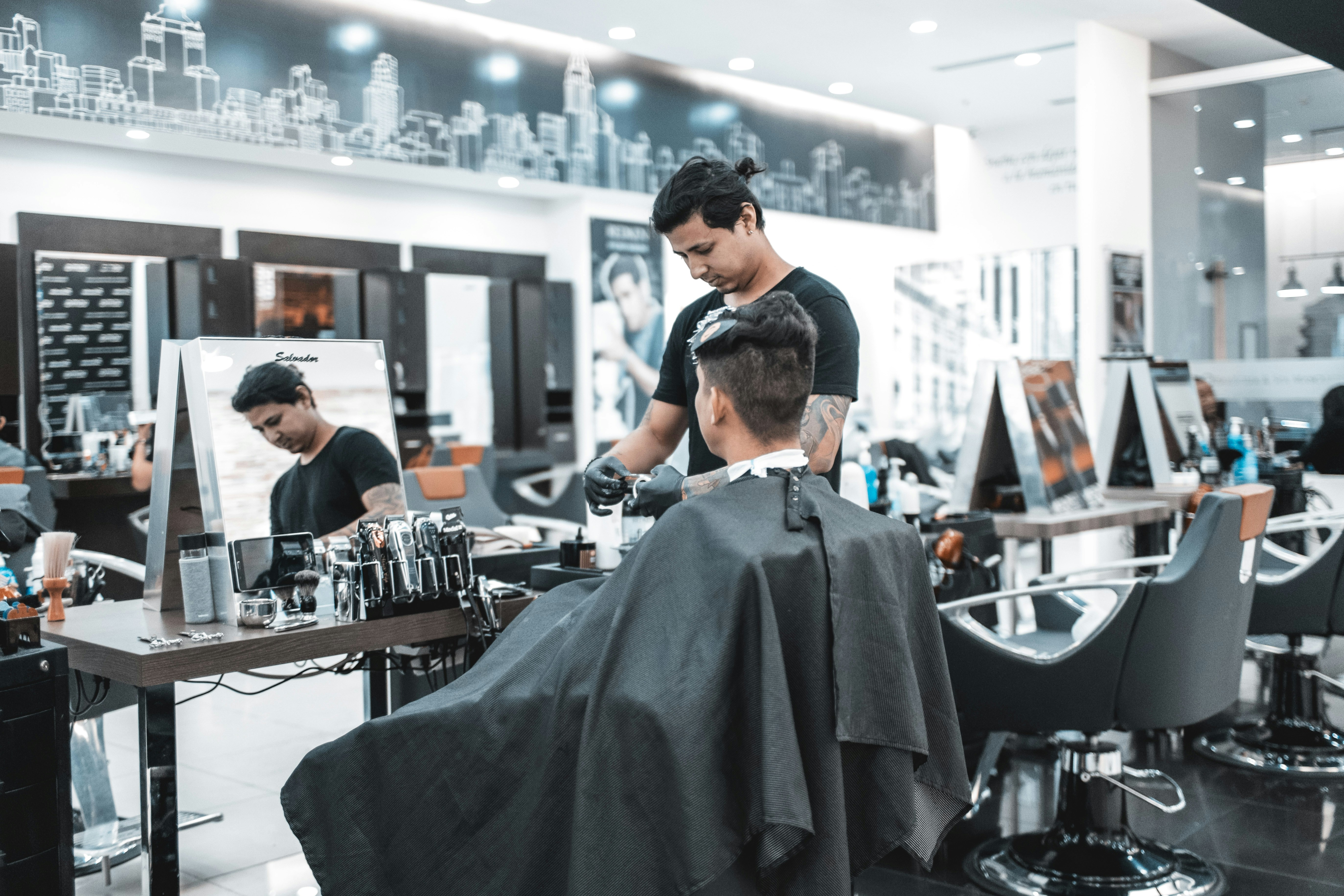 Shallow Focus Photo Of Man Getting A Haircut Photo Free Person