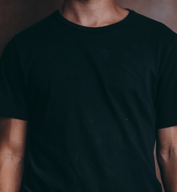 man wearing black crew-neck t-shirt