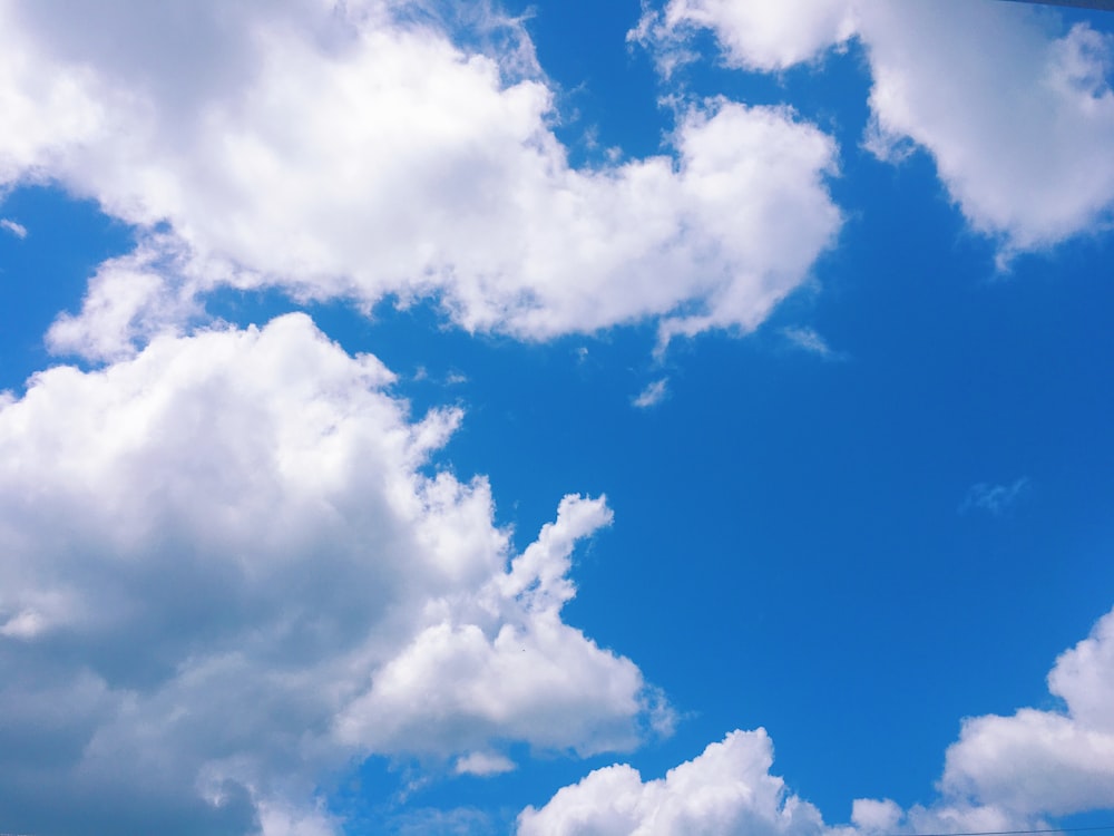 White clouds and blue sky photo – Free Blue Image on Unsplash