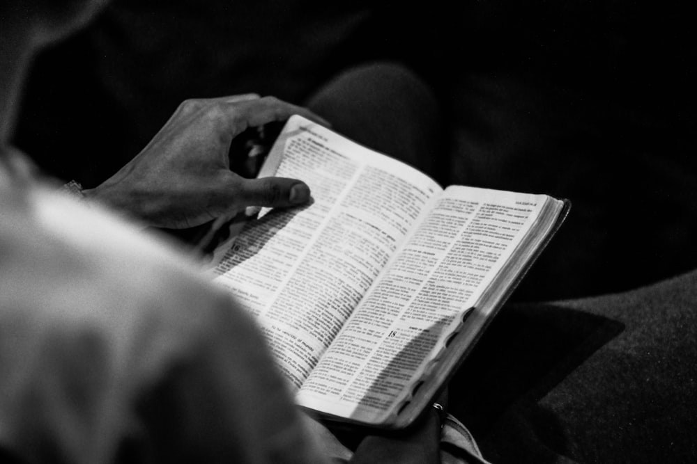 man reading boo