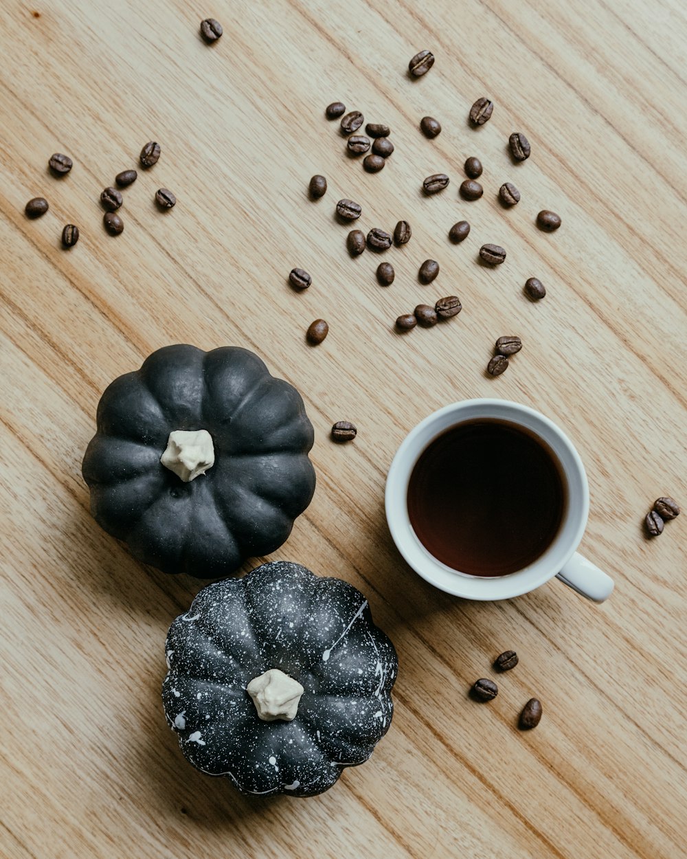 black liquid in white ceramic mug