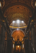 Interior of the cathedral showing elegant traditional architecture and soft beige tones.