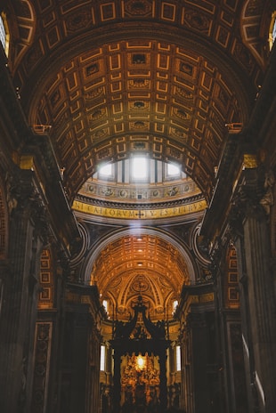 Interior of the cathedral showing elegant traditional architecture and soft beige tones.