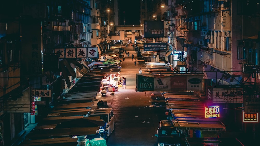 cars parked near building during nighttime