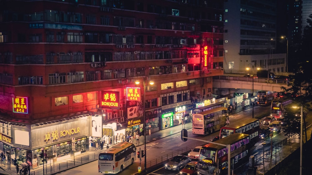 buses on road beside building