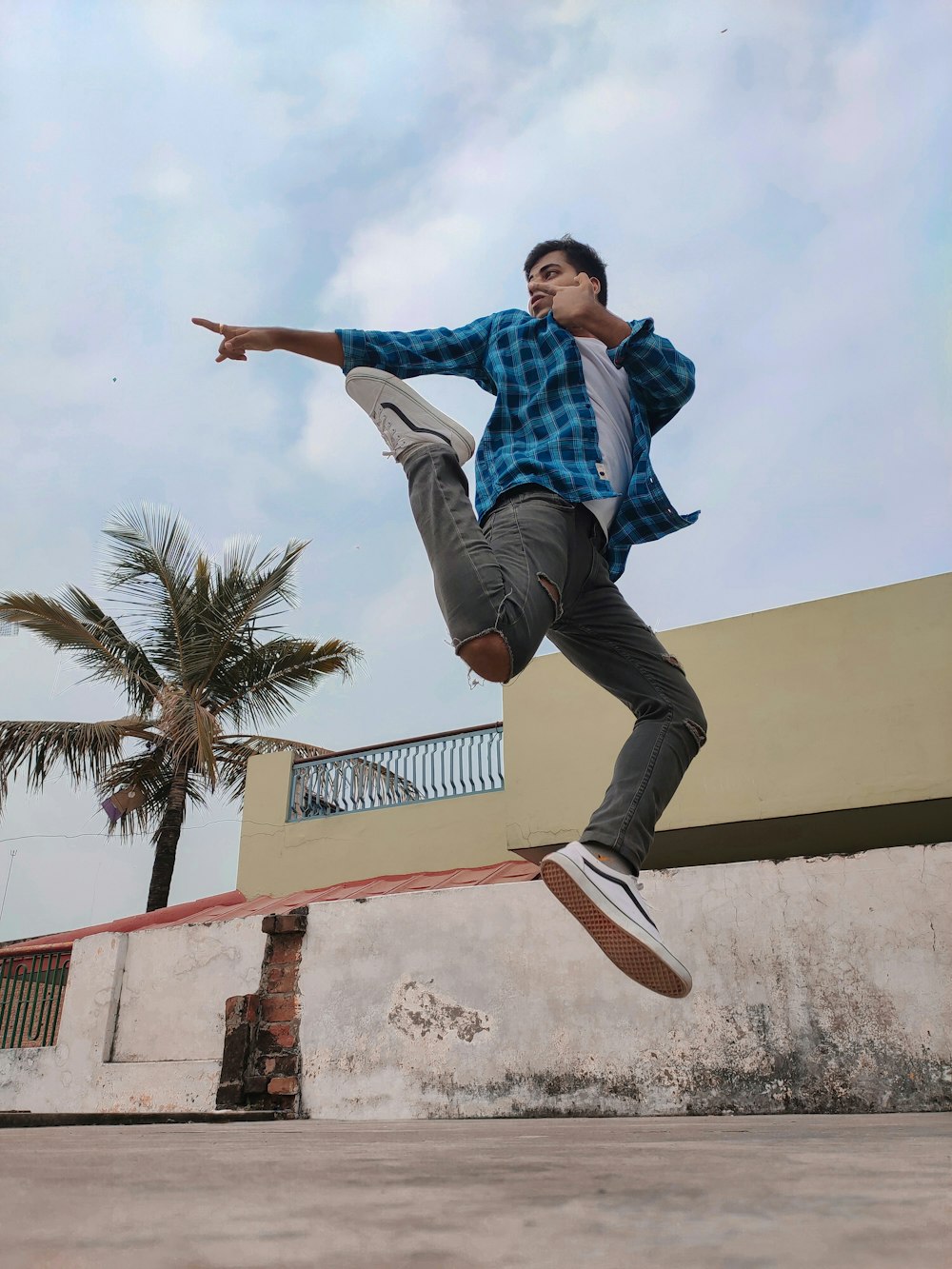 man in blue flannel shirt