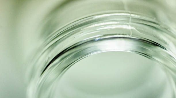 Close-up of a jar of organic pantry items with natural light highlighting the textures.