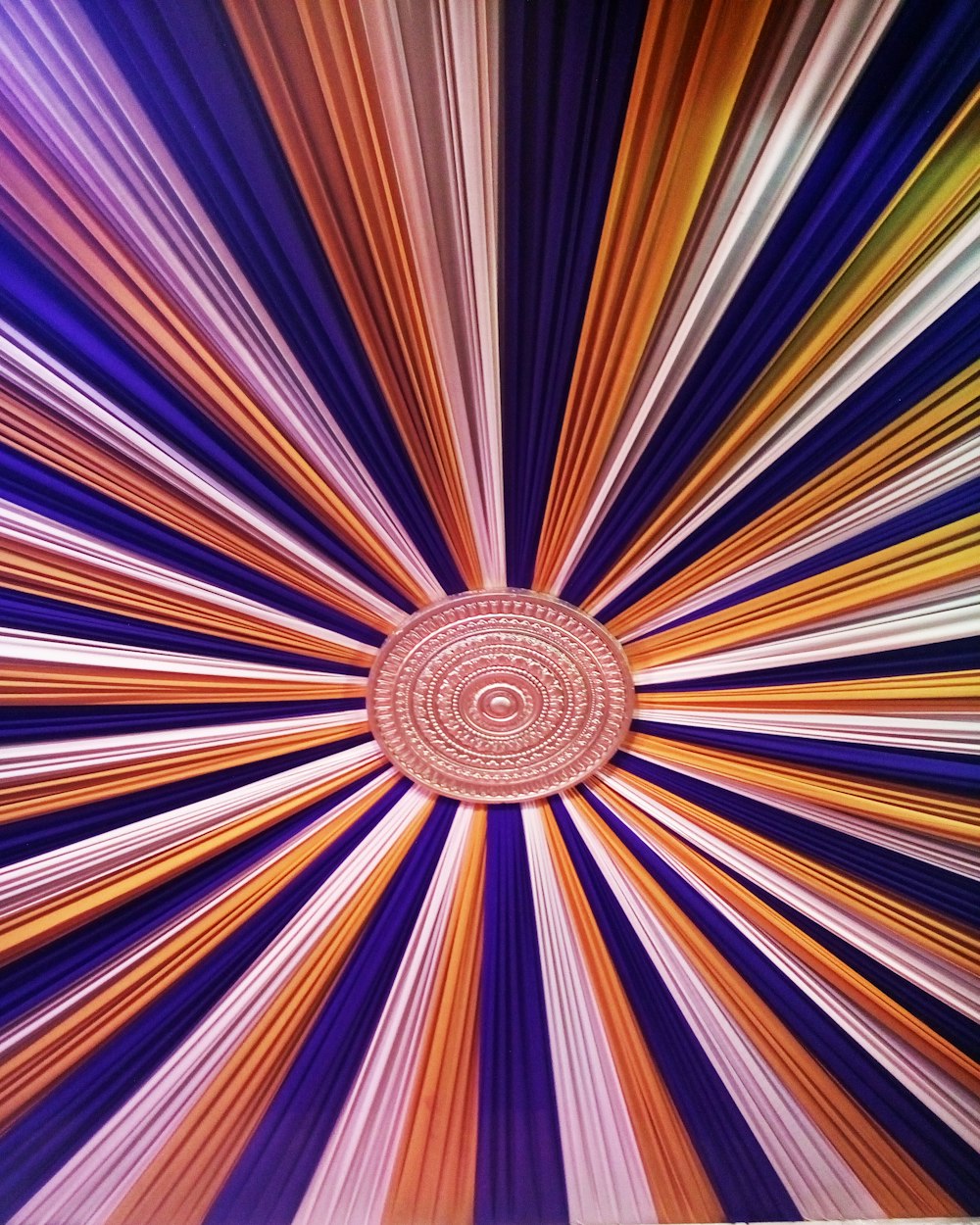 a colorful background with a circular design in the center