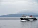 white and black ship on ocean