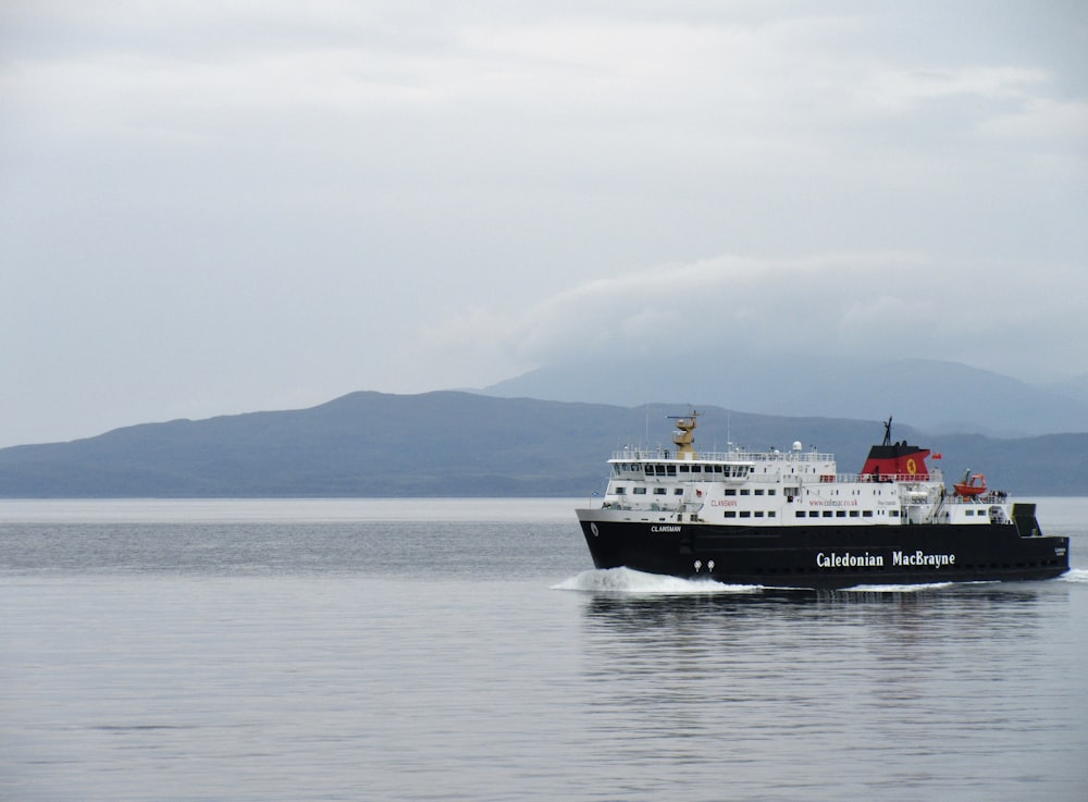 white and black ship on ocean