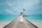 woman wearing white dress standing on sea dock