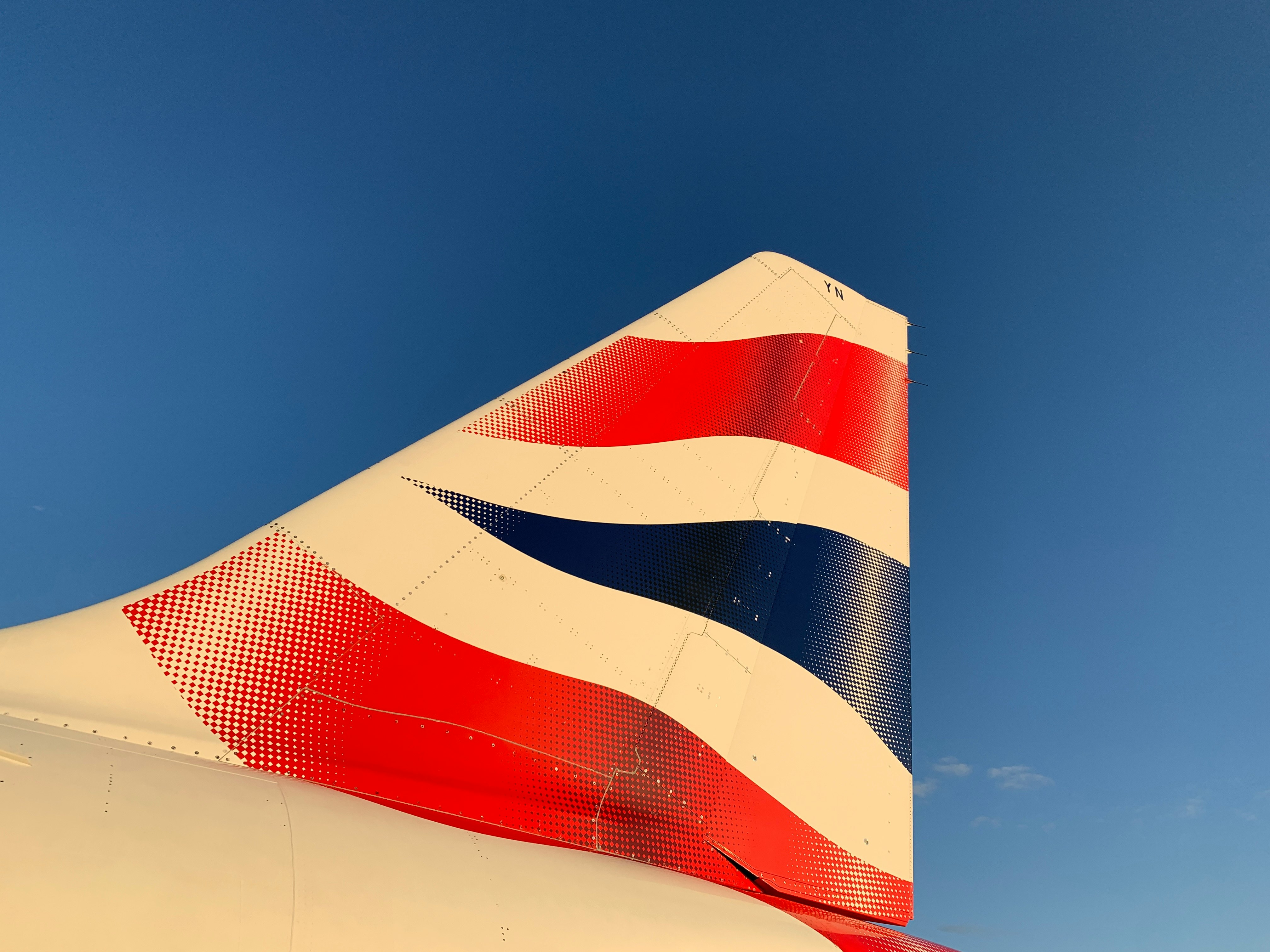 red and blue tail logo of airplanes