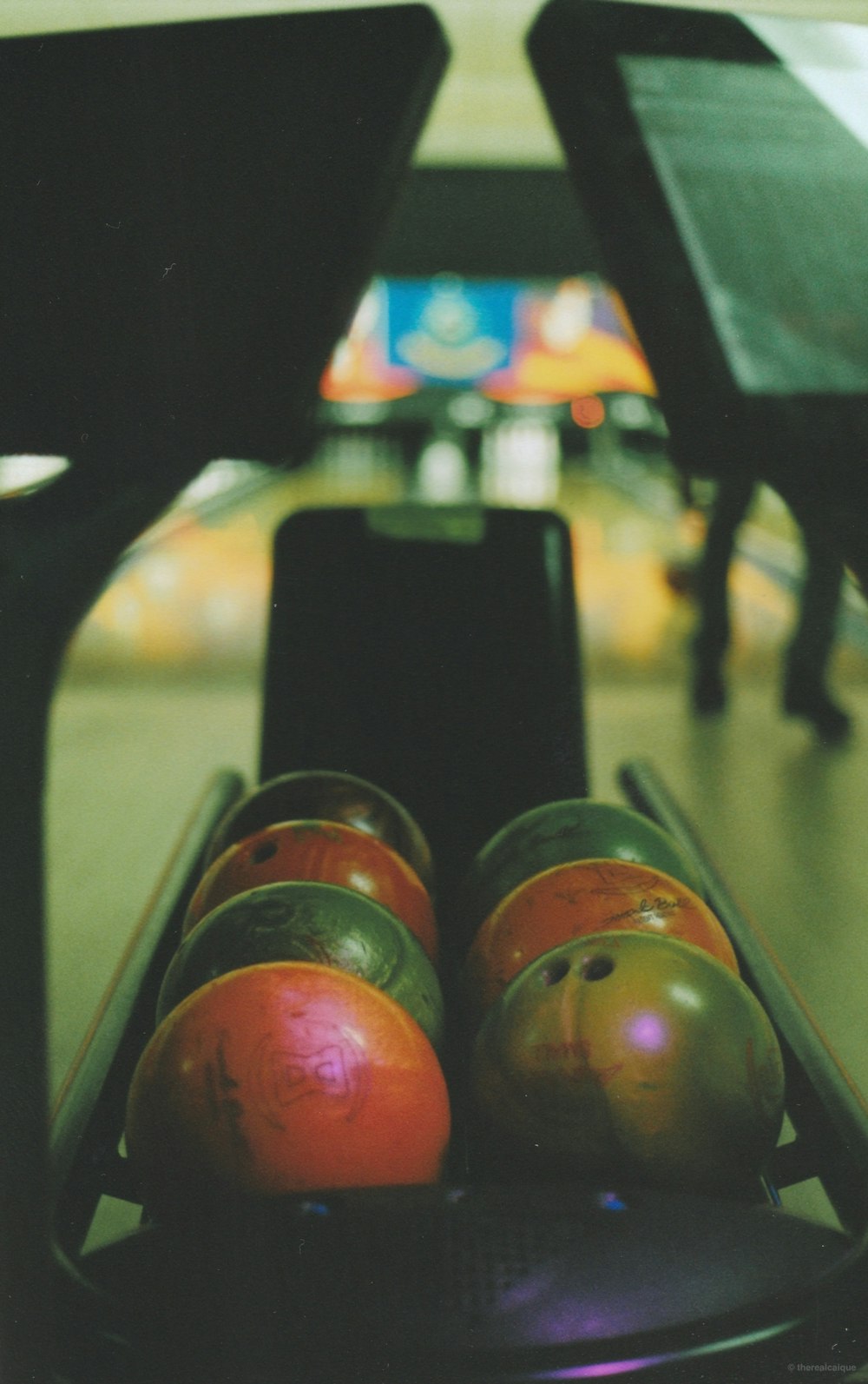 seven assorted-color bowling balls