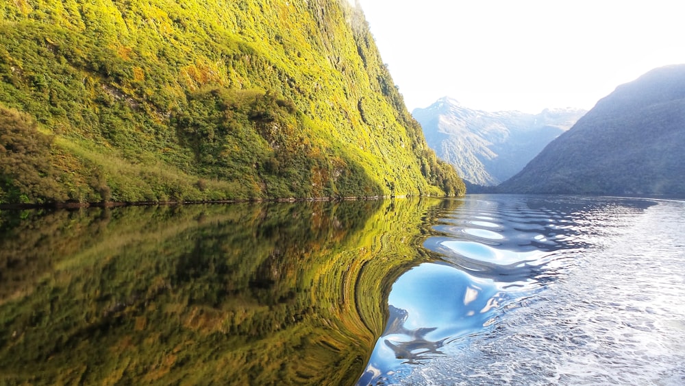 hills beside lake