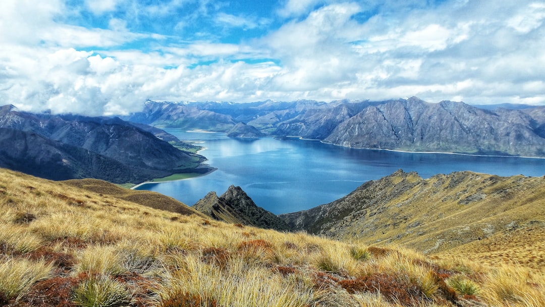 hills beside lake, A view over Lake Wanaka into the mountains and down to the shoreline