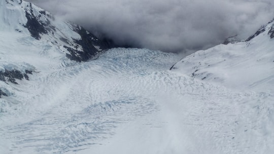 icy mountain scenery in Franz Josef Glacier New Zealand