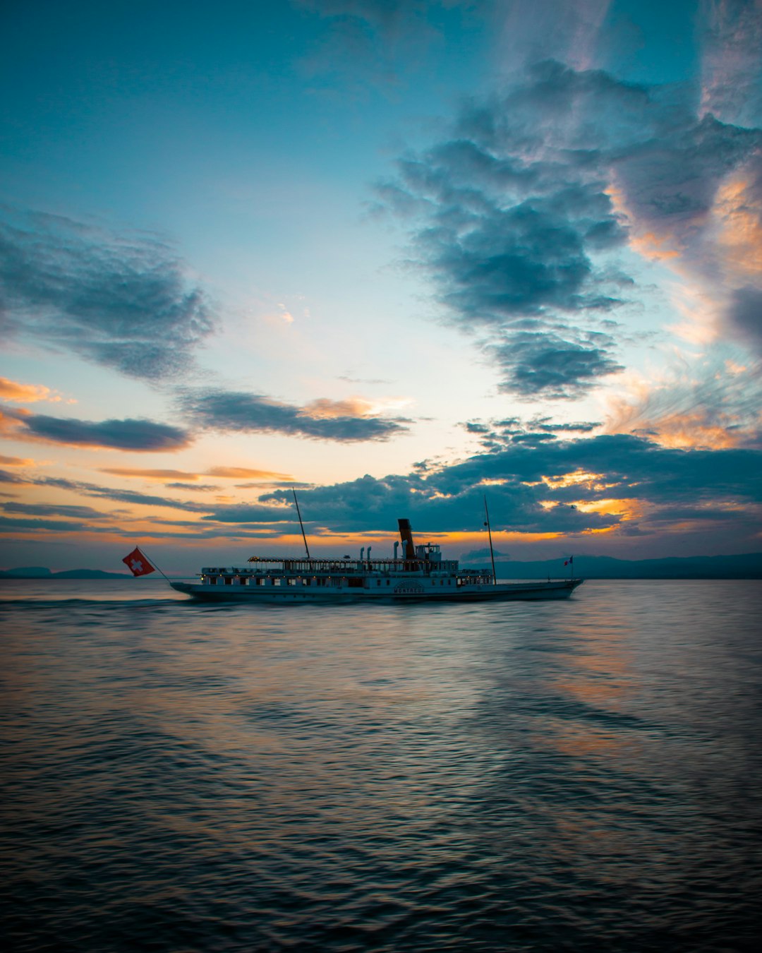 white ship on calm ocean