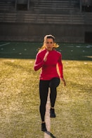 woman exercising on field