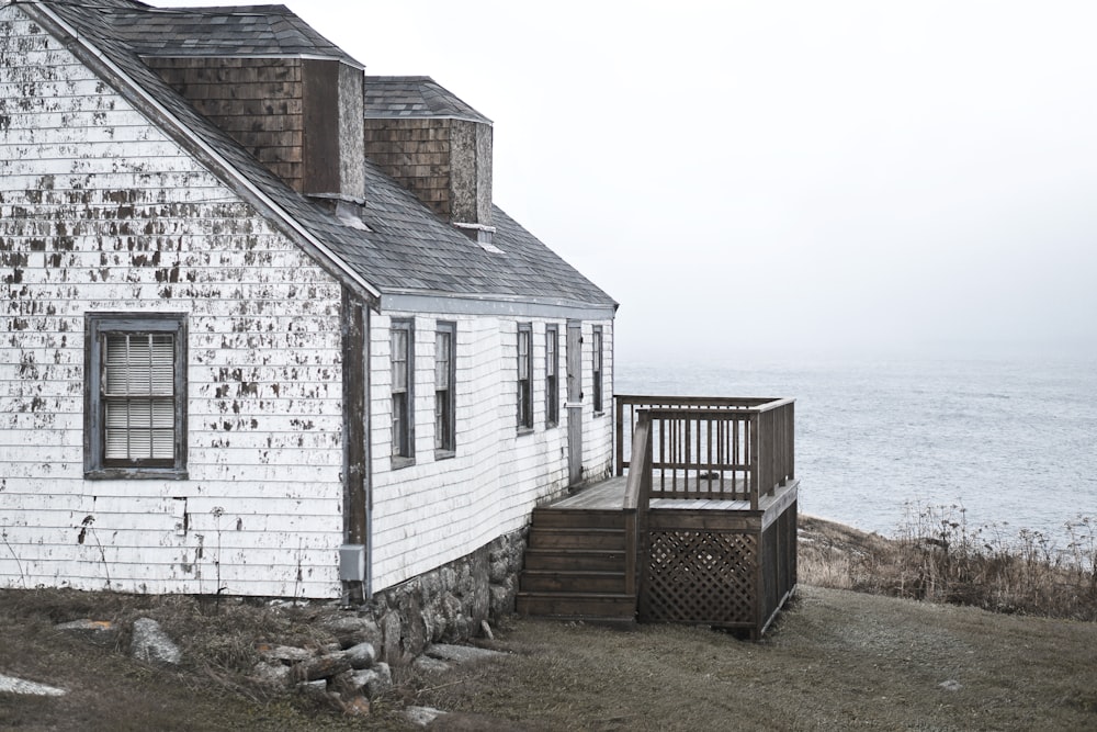 photo of white and brown wooden house