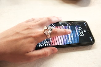 person wearing silver-colored ring