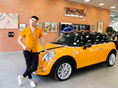 Friendly Excelsior Auto LLC team member ready to assist a customer.