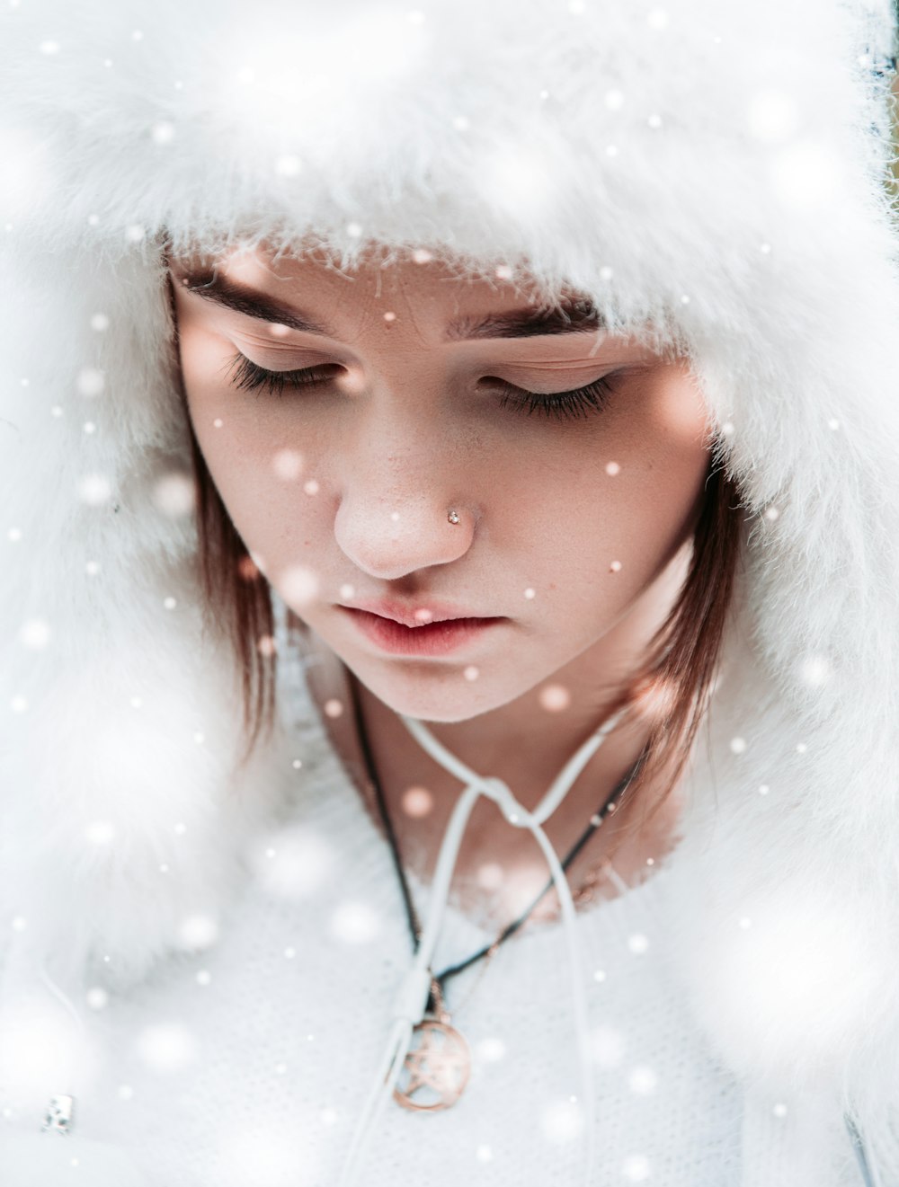 woman in white fur coat