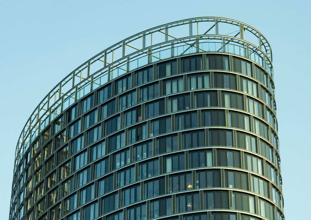 curtain wall high-rise building during daytime