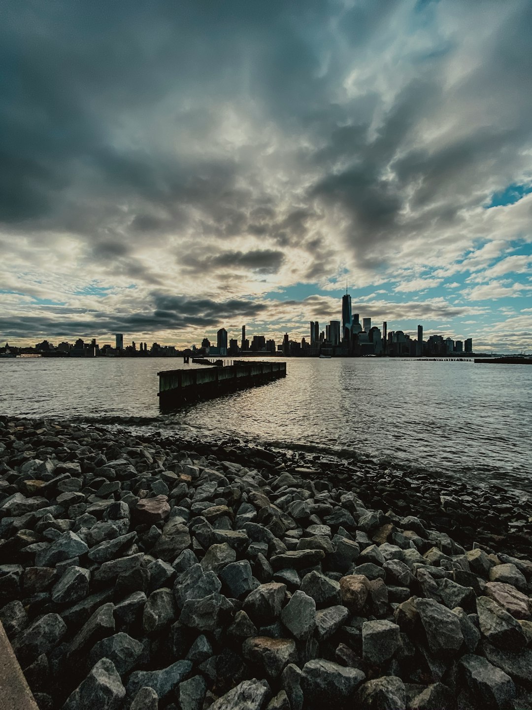 aerial photography of city skyline under cloudy sky