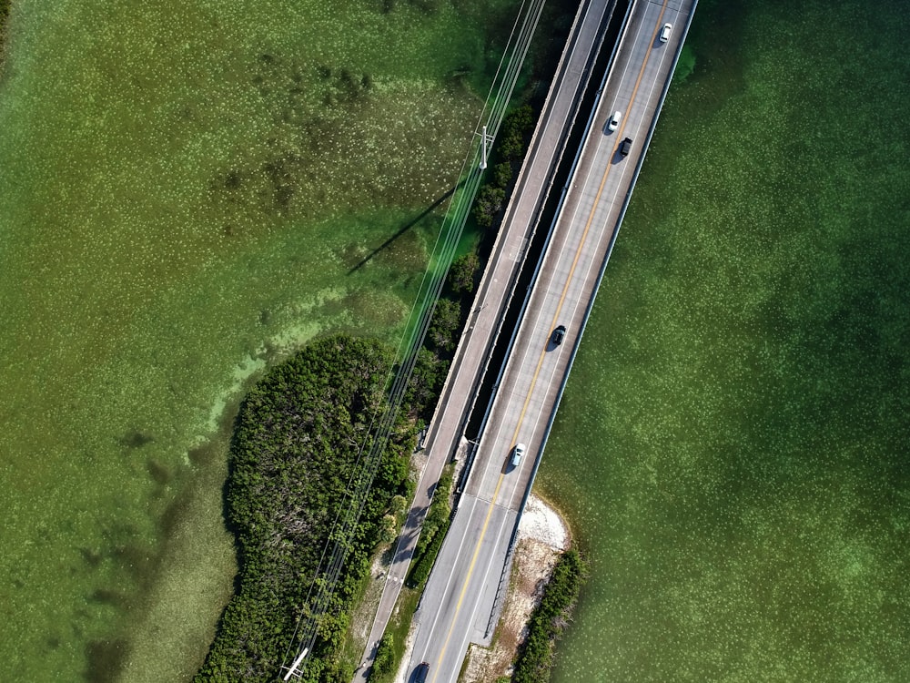 aerial photo of road and grass